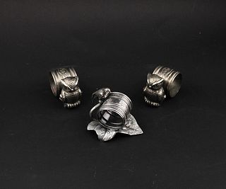 Three Victorian Plated Figural Napkin Rings