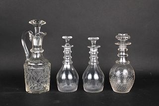 Four Stoppered Crystal Decanters