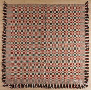 Green, red, and white coverlet, ca. 1840, 88'' x 84''.
