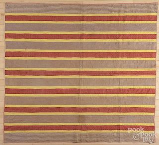 Pieced bar or ribbon quilt, late 19th c., 71'' x 64''.