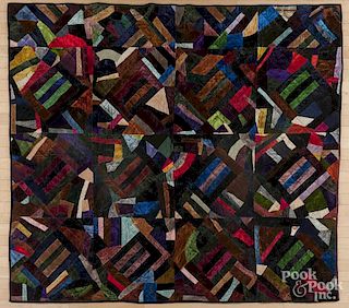 Victorian felt crazy quilt with an early note identifying the maker as Eliza Kreider, 69'' x 77''.