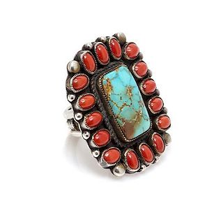 * A Sterling Silver, Turquoise and Coral Ring, Calvin Martinez, Navajo, 12.90 dwts.