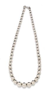A Sterling Silver Graduated Ball Bead Necklace, Tiffany & Co., 19.30 dwts.
