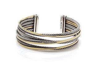 A Sterling Silver and Bonded 18 Karat Yellow Gold Crossover Cuff Bracelet, David Yurman, 35.80 dwts.