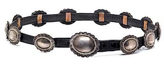 A Sterling Silver, Copper and Leather Concho Belt, Irv Paul, Navajo, 215.70 dwts. (including leather)