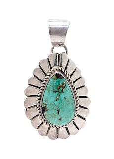 * A Sterling Silver and Turquoise Pendant, Marcella James, Navajo, 8.10 dwts.