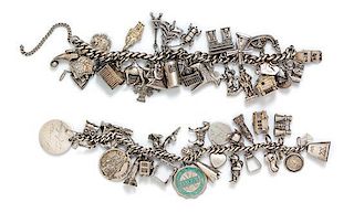 * A Collection of Silver Charm Bracelets with Numerous Attached Charms, 137.80 dwts.