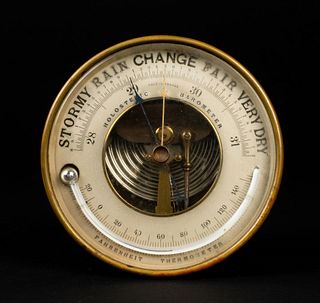 An Antique Brass Holosteric Ship's Barometer