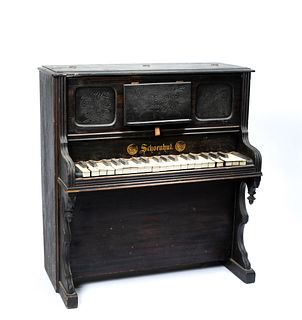 An Antique Schoenhut Upright Child's Piano
