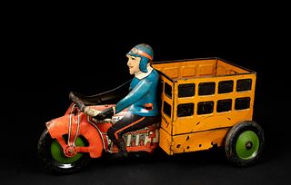 A 1930's Marx US Tin Wind Up Motorcycle Toy