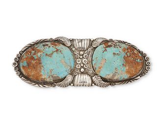 A large Navajo silver and turquoise belt buckle