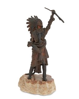 Carl Kauba (1865-1922), A Native American in headdress raising a rifle, Patinated bronze mounted to a stone plinth, 10.5" H x 3.5" W x 4.5" D; with ba