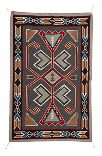 A Navajo Teec Nos Pos saddle blanket