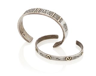 Two Southwest sterling silver and gold cuff bracelets