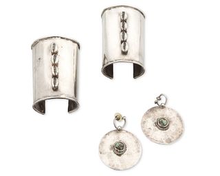 A group of silver jewelry by V Wilson
