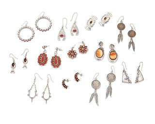 A group of Southwest silver earrings