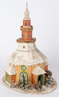 Large cardboard snow covered Christmas church