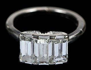 14kt. Three Diamond Emerald Cut Ring with Fingermate Shank