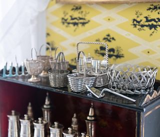 Group of Silver Plate Basket Weave Condiment Wares and A Pair of Silver Plate Toast Racks 