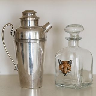 Silver Plate Cocktail Pitcher and Painted Glass Fox Decanter and a Stopper