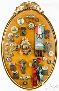 Three framed groups of political buttons