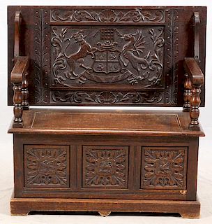 CARVED OAK MONK'S BENCH LATE 19TH/EARLY 20TH C.