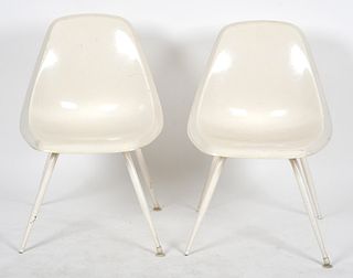 Pair of Mid Century White Molded Chairs