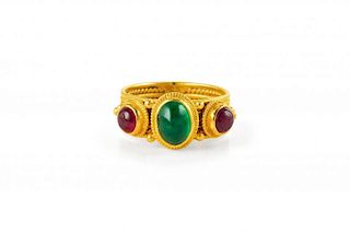 An Ilias Lalaounis Gold, Emerald and Ruby Ring