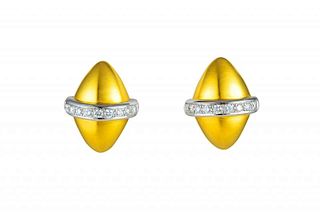 A Pair of Marlene Stowe Gold, Platinum and Diamond Earclips