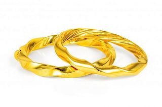 A Pair of Gold Twisted Tubular Bangles