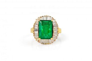A Gold, Emerald and Diamond Ballerina Ring