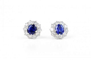 A Pair of Platinum, Diamond and Sapphire Earrings