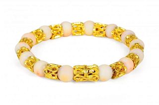 A Gold and Coral Bracelet