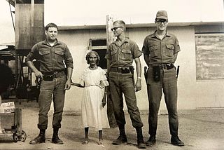 Annie Leibovitz, American Soldiers And The Queen Of The Negritos, Clark Air Force Base, The Philippines, 1968