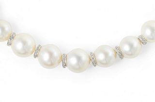 A Cellini Platinum, Gold, Pearl and Diamond Necklace