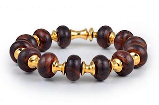 A Marina B Wood Bead and Gold Cimin Bracelet