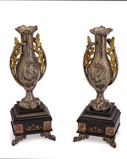 A pair of Victorian garniture urns