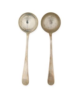 A pair of Georgian English sterling silver sauce ladles