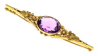 Amethyst brooch GG 585/000 around 1900 with one oval faceted amethyst 15,8 x 12,2 mm, l. 66 mm, 7,