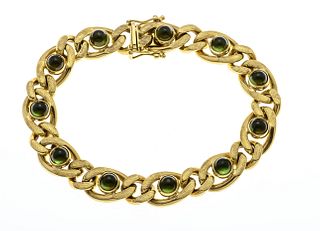 Flat armor bracelet GG 585/000 partially matted surface set with 11 round tourmaline cabochons 5 mm,