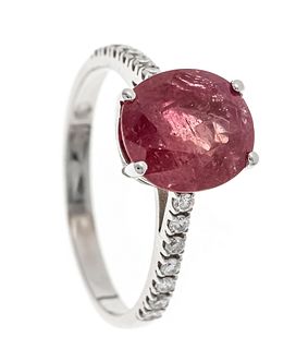 Ruby-brilliant ring WG 750/000 with one oval faceted ruby 9,5 x 8,6 x 5,1 mm, brownish pink,