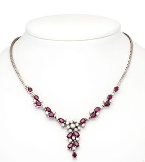 Ruby-brilliant necklace WG 750/000 with 17 natural very good drop-shaped faceted rubies, total 4,