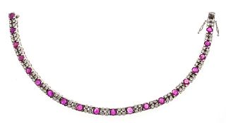 ruby diamond bracelet WG 750/000 with 20 natural very good round faceted rubies, add. 3,60 ct,