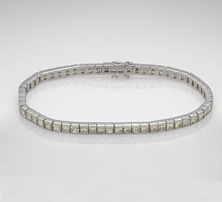 Fancy diamond riviÃ©re bracelet WG 750/000 with 59 princess diamonds, total 12.39 ct, l. 20 cm, 20.
