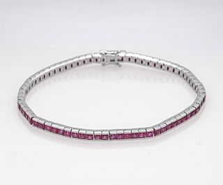 Ruby riviÃ©re bracelet WG 750/000 with 72 faceted ruby carrÃ©es, add.8,21 ct darker pink red,