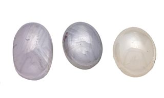 3 oval star sapphire cabochons, add. 12.70 ct, light blue-gray - light gray, translucent, with