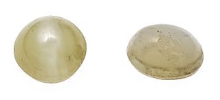 2 Chrysoberyl cat's eye cabochons, 1.65 ct. total, light gray, opaque, 5.0 x 3.8 mm and 5.2 x 4.0
