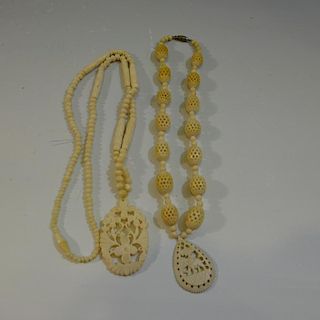 TWO CARVED NECKLACE