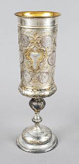 Large coin cup, 20th c., plated, round stand, baluster stem, slightly conical dome bulged in the lower part, wall with relief decoration, dome with 17