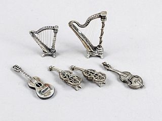 Six miniature stringed instruments, 20th c., silver 800/000, tested and plated, 2 harps, guitar and 3 violins, l. to 6.5 cm, total wt. approx. 55 g